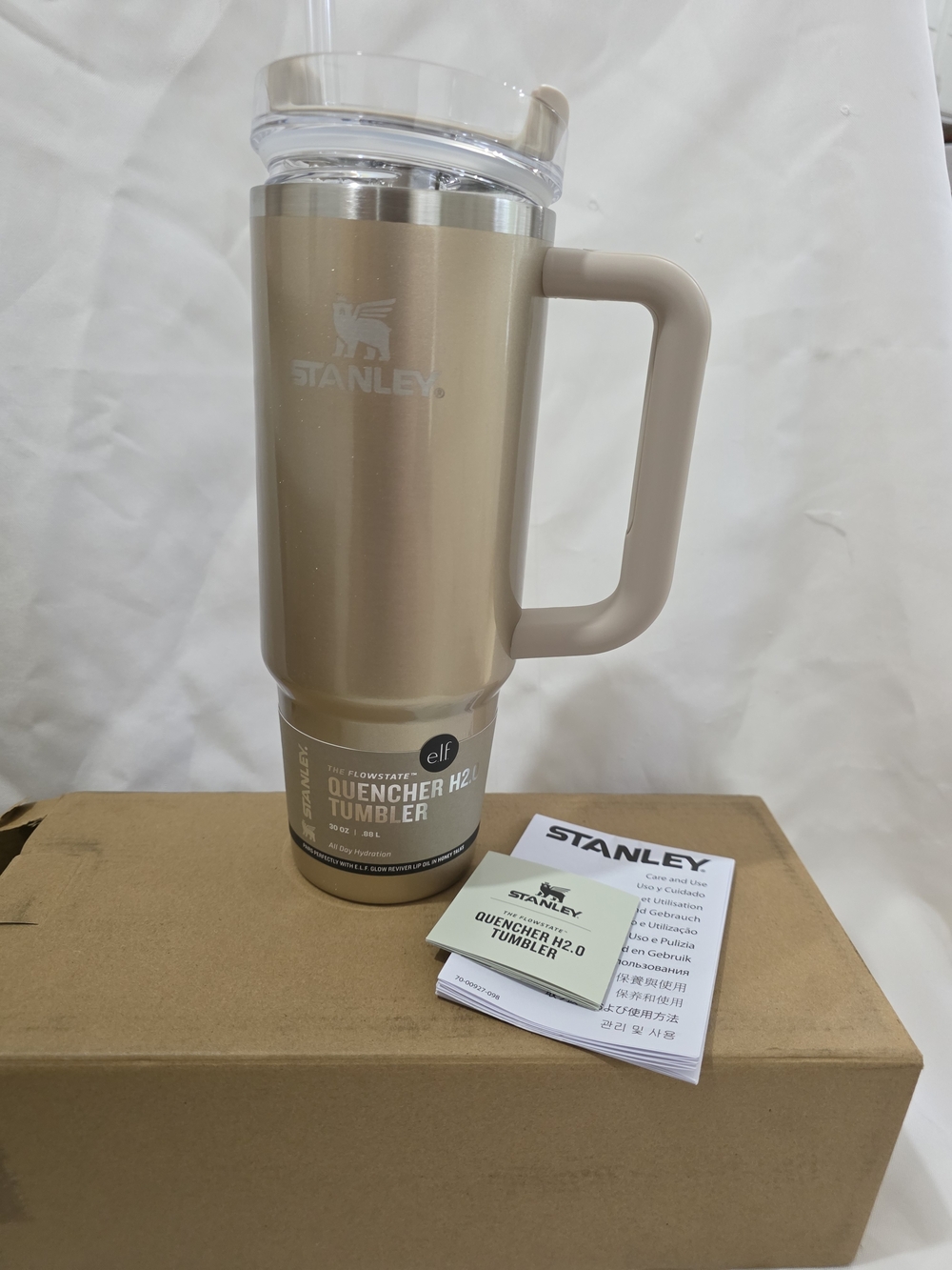 Gold 30oz Stanley x e.l.f. FlowState Quencher H2.0 Tumbler in the "Honey Talks"